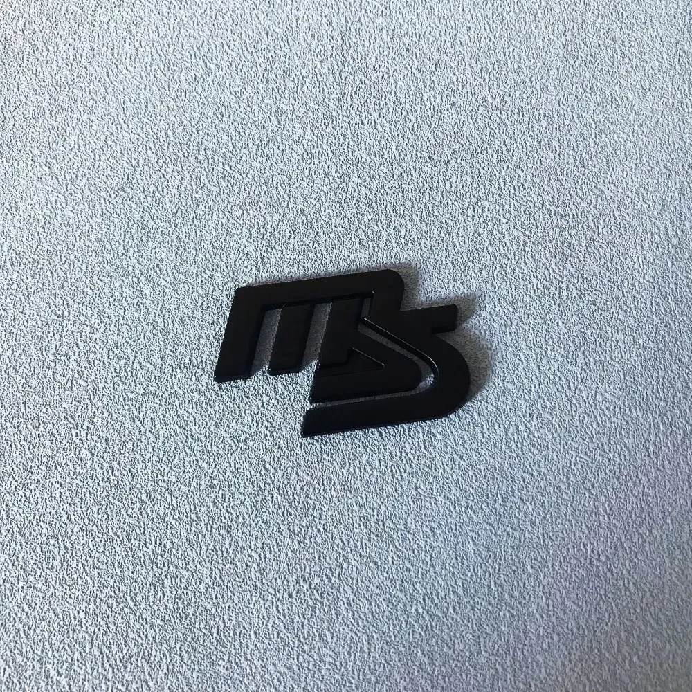 Фото Металлическая эмблема-наклейка MS для кузова автомобиля Mazda CX5, CX30, CX9, Atenza, Axela, RX7, Speed, Protege, на окно или боковую часть №4