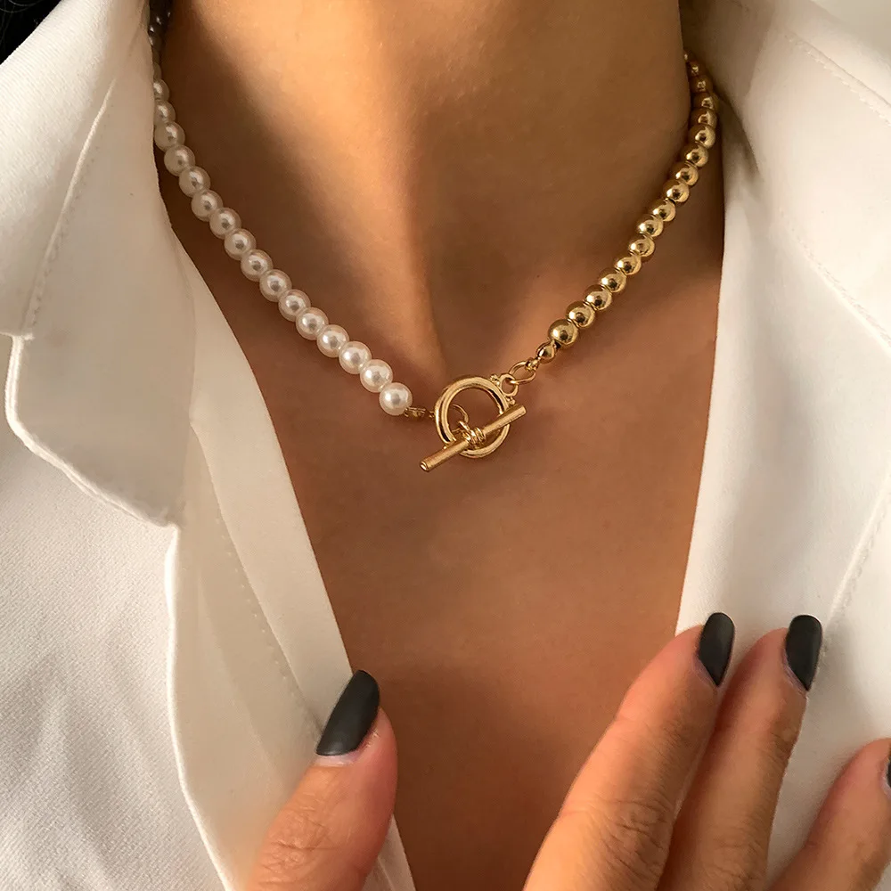 

New necklace female niche design pearl necklace special-shaped stitching clavicle chain asymmetric buckle gold ball necklace