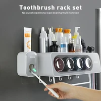 wall mounted bathroom toothbrush holders automatic toothpaste squeezer dispenser storage racks organization bathroom accessories