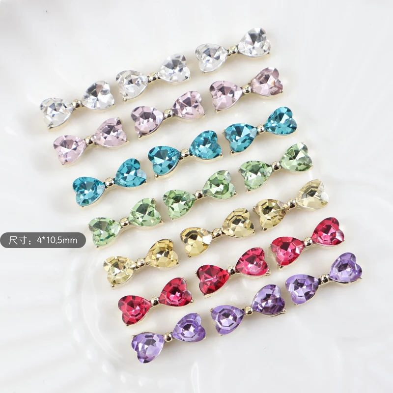 

High Quality Alloy Inlaid Crystal Glass Heart Diamond Bow Tie Flatback Nail Art Rhinestone 4x10.5MM 3D For Manicure Accessories