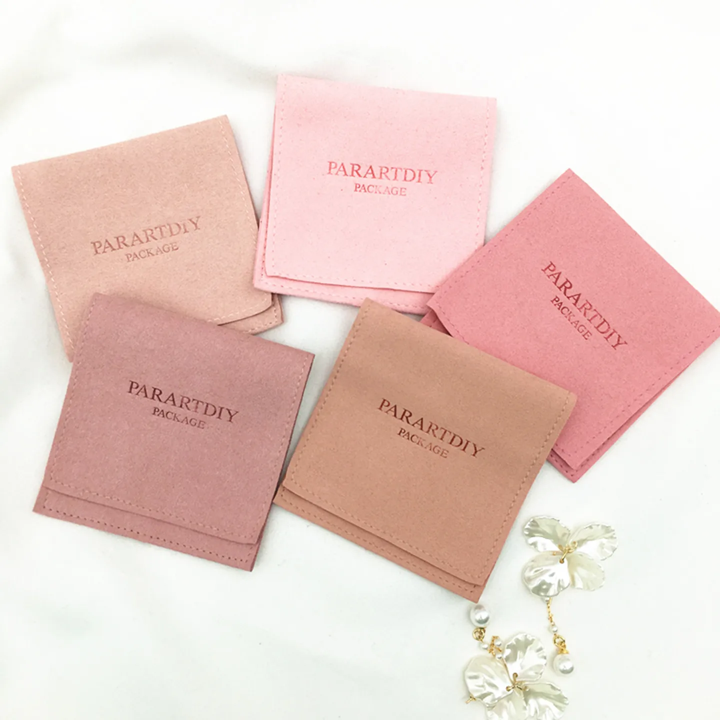 

Custom Logo Velvet Jewellery Bag Folded Microfiber Fabric Jewelry Packaging Organizer Bag for Ring Earrings Bracelet Display