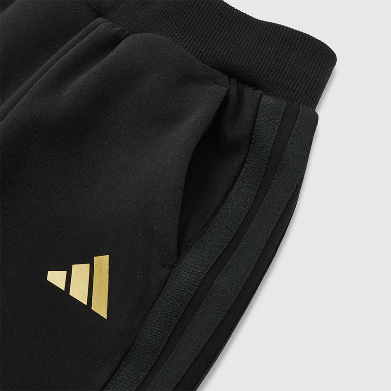 Фото Оригинальные детские спортивные брюки Adidas 128, черно-желтые, приятные к телу, модель KU5595. №3