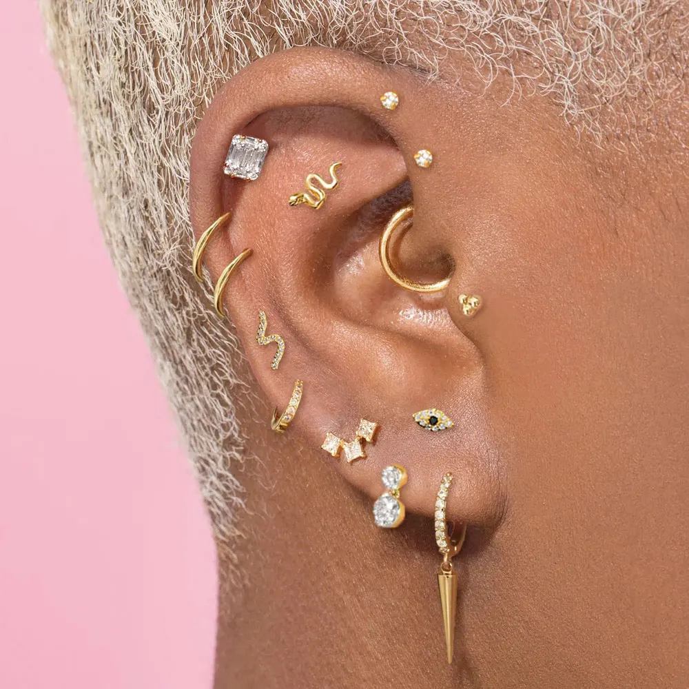 Женские серьги-подвески со змеиным козелком и завитками