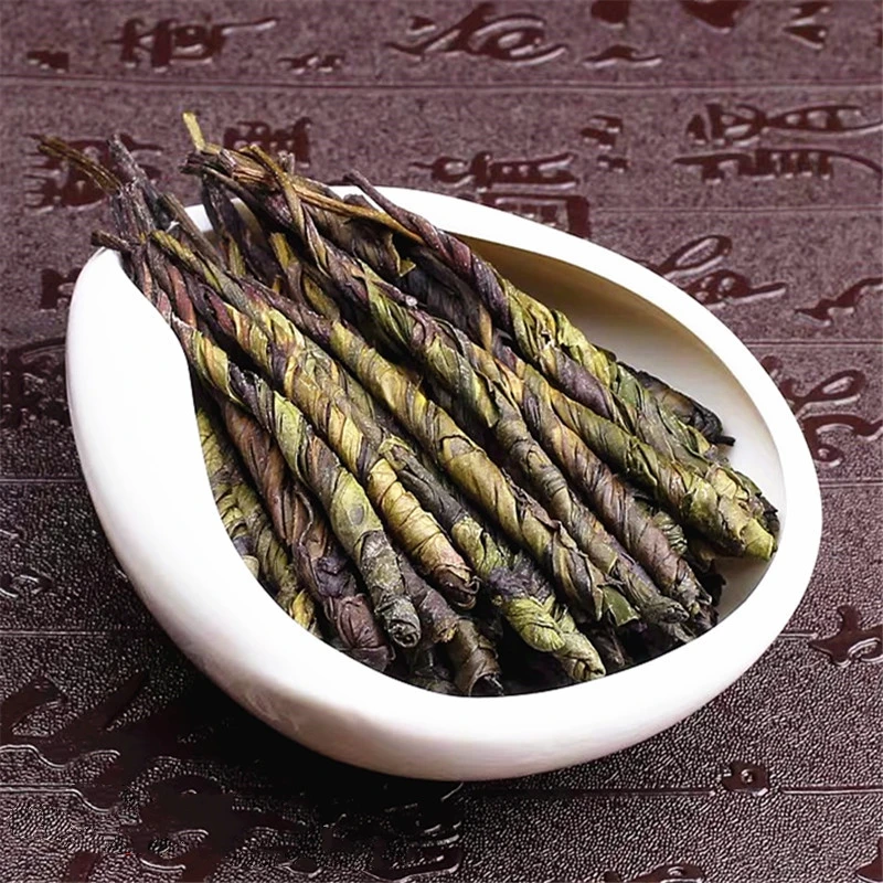 

2021 China HaiNan High Quality Big Leaf Kuding Tea 250g Natural Herbal Flower Tea For Clear Fire Detoxification Health Care Tea