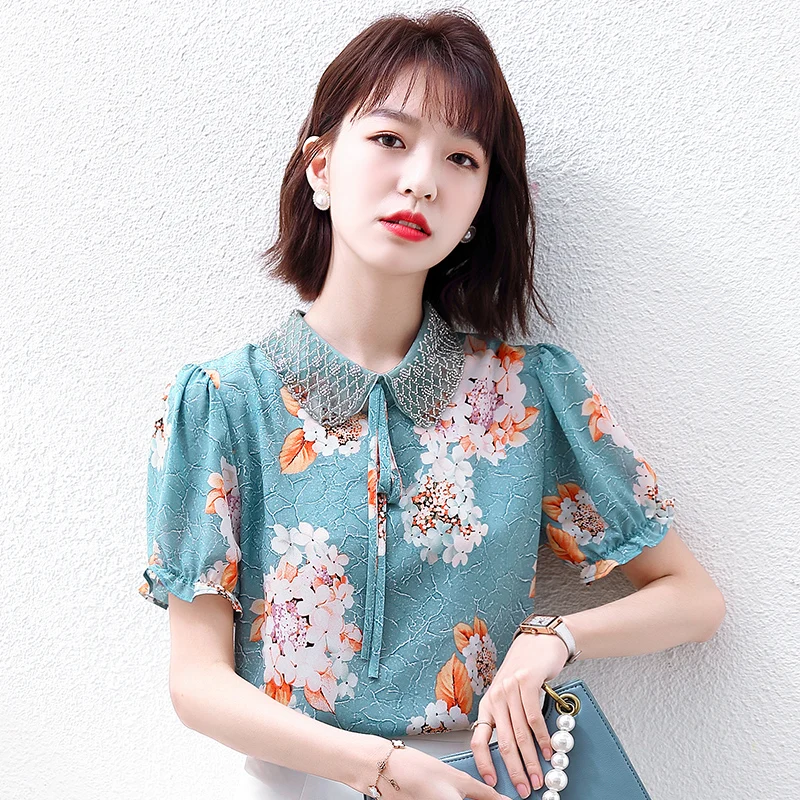 

Летняя блузка с коротким рукавом, топ, корейская мода, рубашка с лацканами, шифоновая Повседневная прямая женская одежда с принтом Houthion