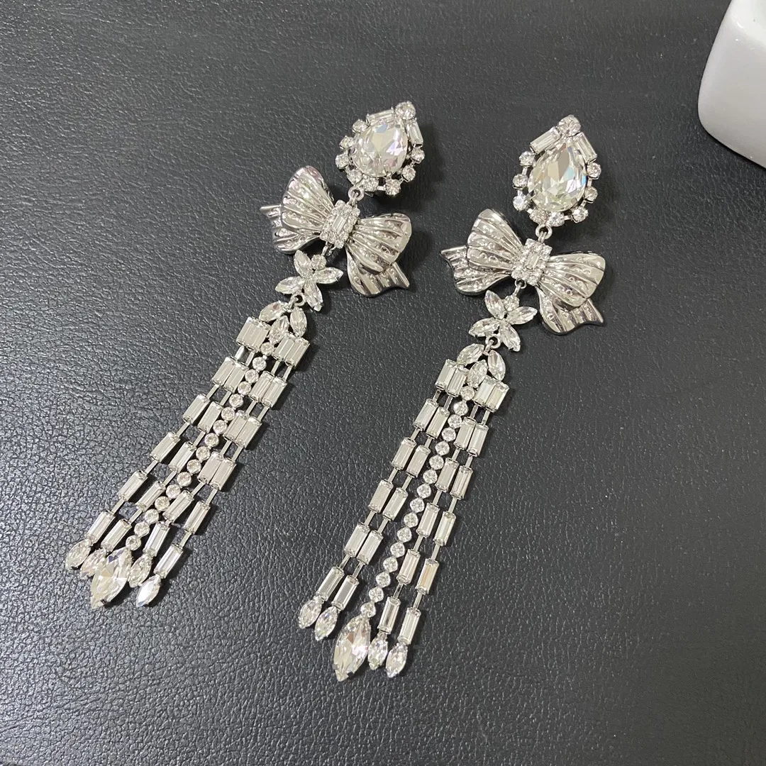 

European and American popular bow tassel ear clip