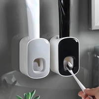 2022automatic toothpaste dispenser wall mount bathroom bathroom accessories waterproof toothpaste squeezer toothbrush holder