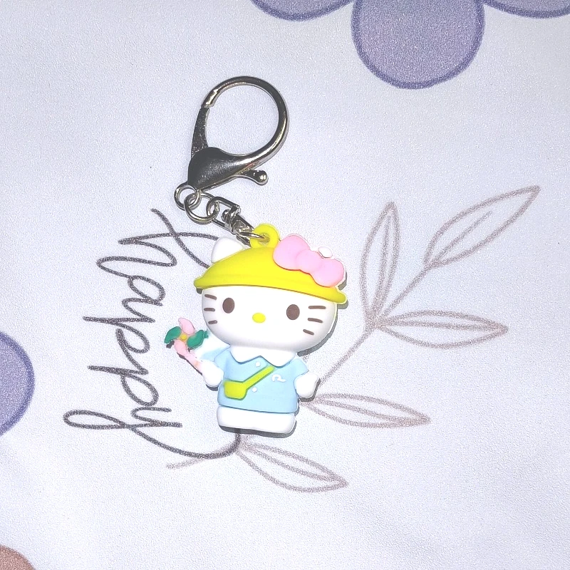 Фото Оригинальный лицензионный брелок-подвеска Sanrio с Куроми и Хеллоу Китти, милый силиконовый аниме-шарм для сумок, кошельков и ключей. №4