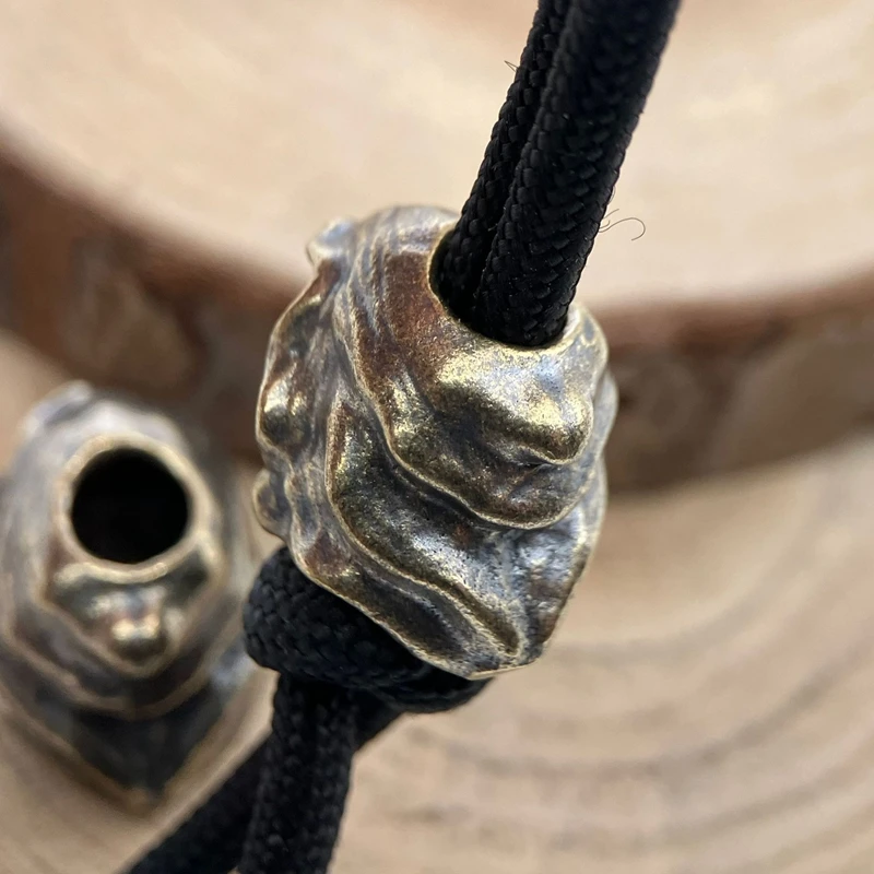 Фото Бусины-подвески из латуни в форме головы хакера для ножей, EDC, DIY, плетеных браслетов из паракорда, шнурков, аксессуаров, подвесок для инструментов и украшений для активного отдыха №4