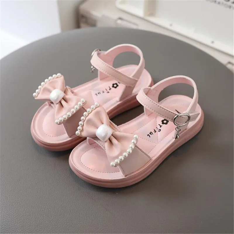 

Сандалии для девочек, обувь принцессы, Новинка лета 2022, корейская детская пляжная обувь с бантом на мягкой нескользящей подошве и открытым н...