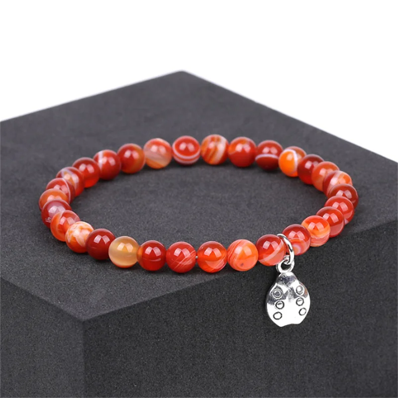 Женский и мужской браслет с подвеской божья коровка