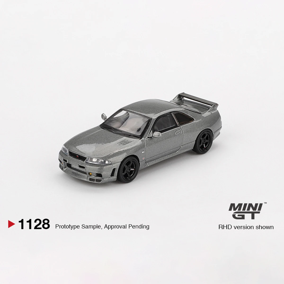 Фото В наличии, готов к отправке: MiniGT 1128 1:64 Nissan Skyline GT-R R33, металлик, темно-серый, праворульный, литая модель автомобиля # 1128 №2