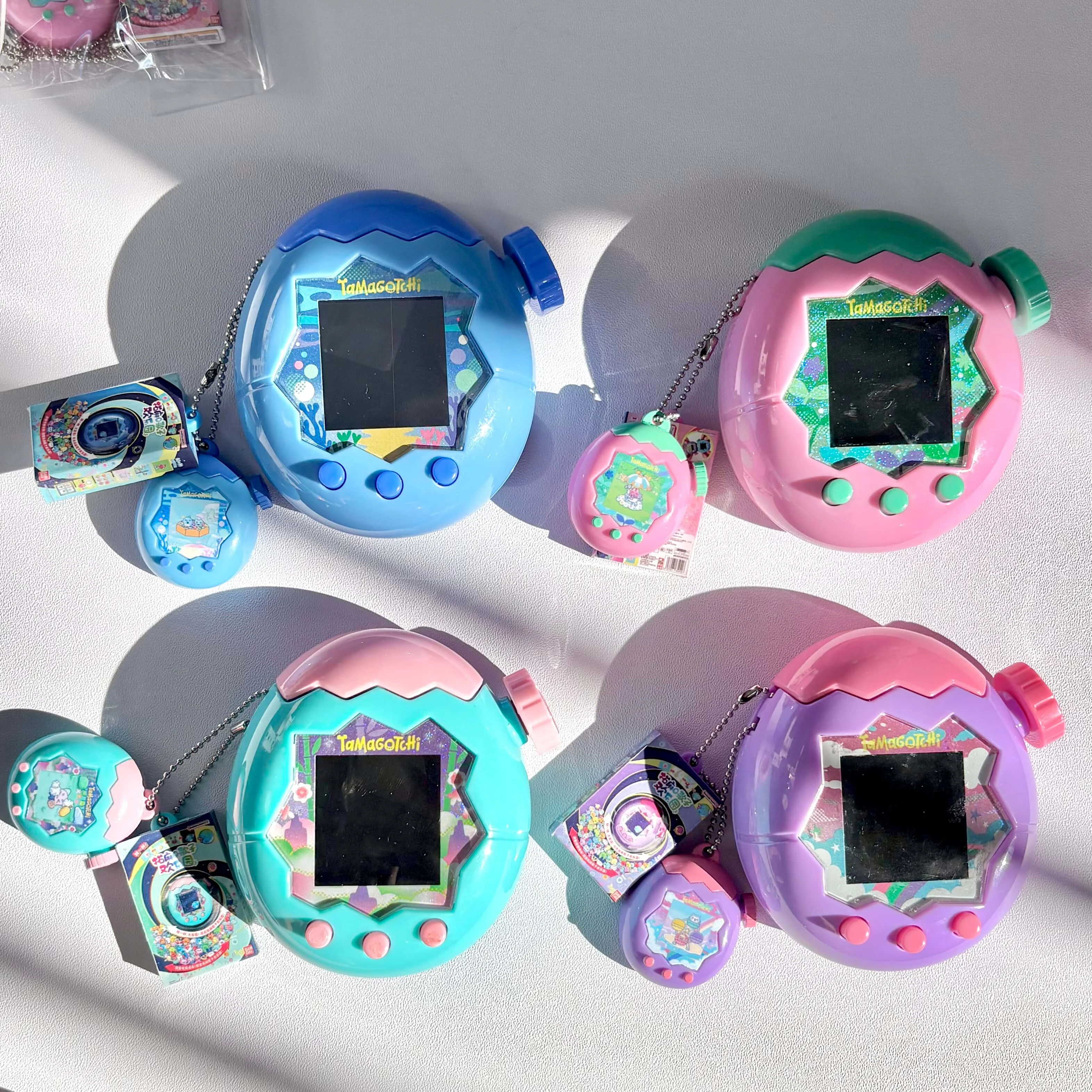 Фото Милый мини-брелок-симулятор Tamagotchi Paradise Series: электронная игрушка-питомец, аксессуар, модель, игрушка-брелок №2