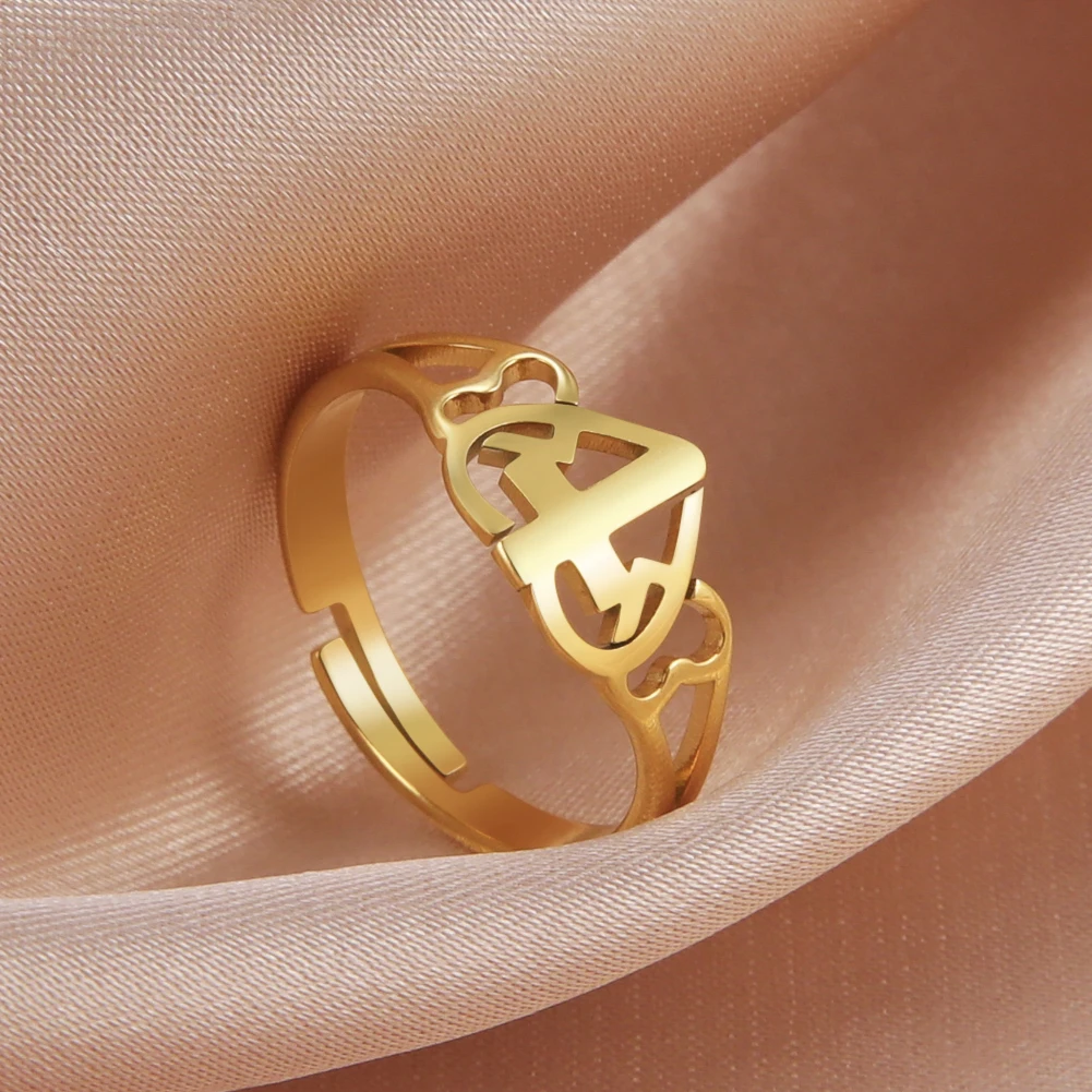 

Adjustable Women's Ring Hollow Three Heart Cross Ring Simple Stainless Steel Jewelry for Lover Anniversary Gifts