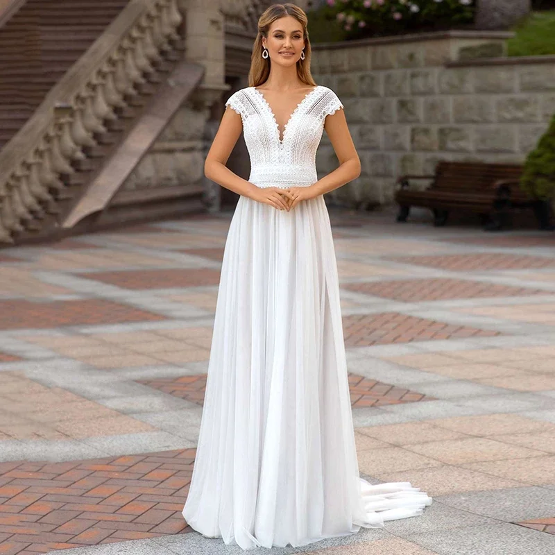 

2023 new beach wedding dress lace V-neck ivory wedding bridal bridal sleeve sweeping train backless and ground wedding dress cus