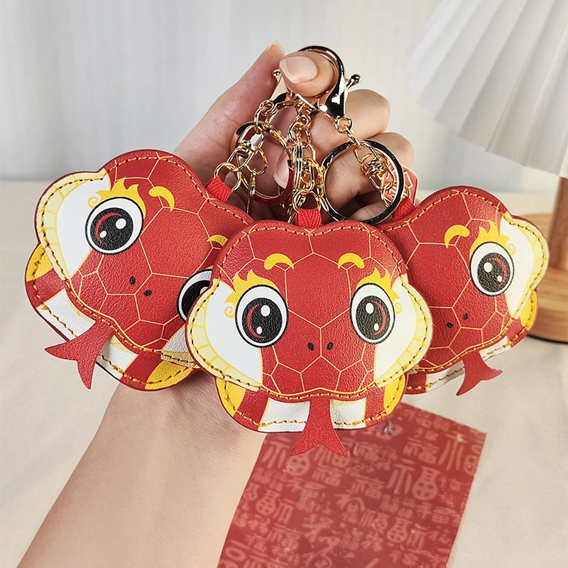 Новогодний брелок из искусственной кожи благословение змея для ключей