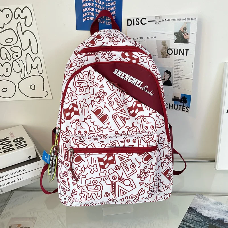 

Милые нейлоновые рюкзаки с мультяшным рисунком для женщин 2023, легкая школьная сумка, Женский дорожный рюкзак, модные рюкзаки для девочек