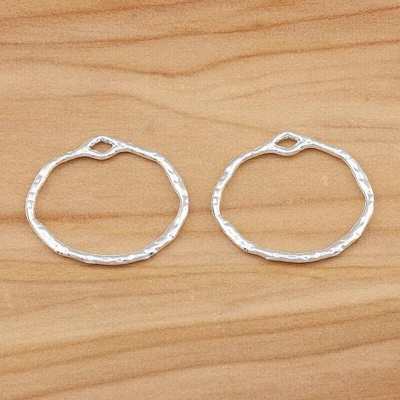 Открытые серьги неправильной геометрической формы, размеры 35x34 мм