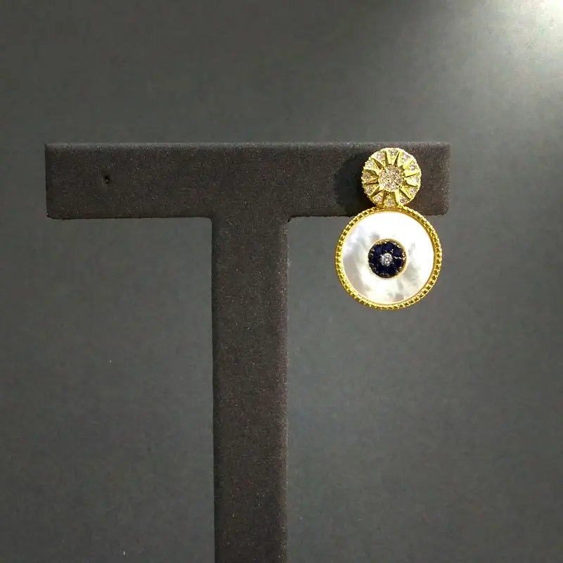 

s925 sterling silver September new product single big lucky eye earrings female golden yellow mother shell dot earrings