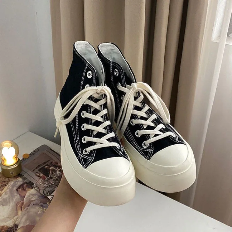 

Thick soled canvas shoes, high cut, new Korean version of ulzzang student casual versatile board shoes لوروبيانا احذيه نسائي