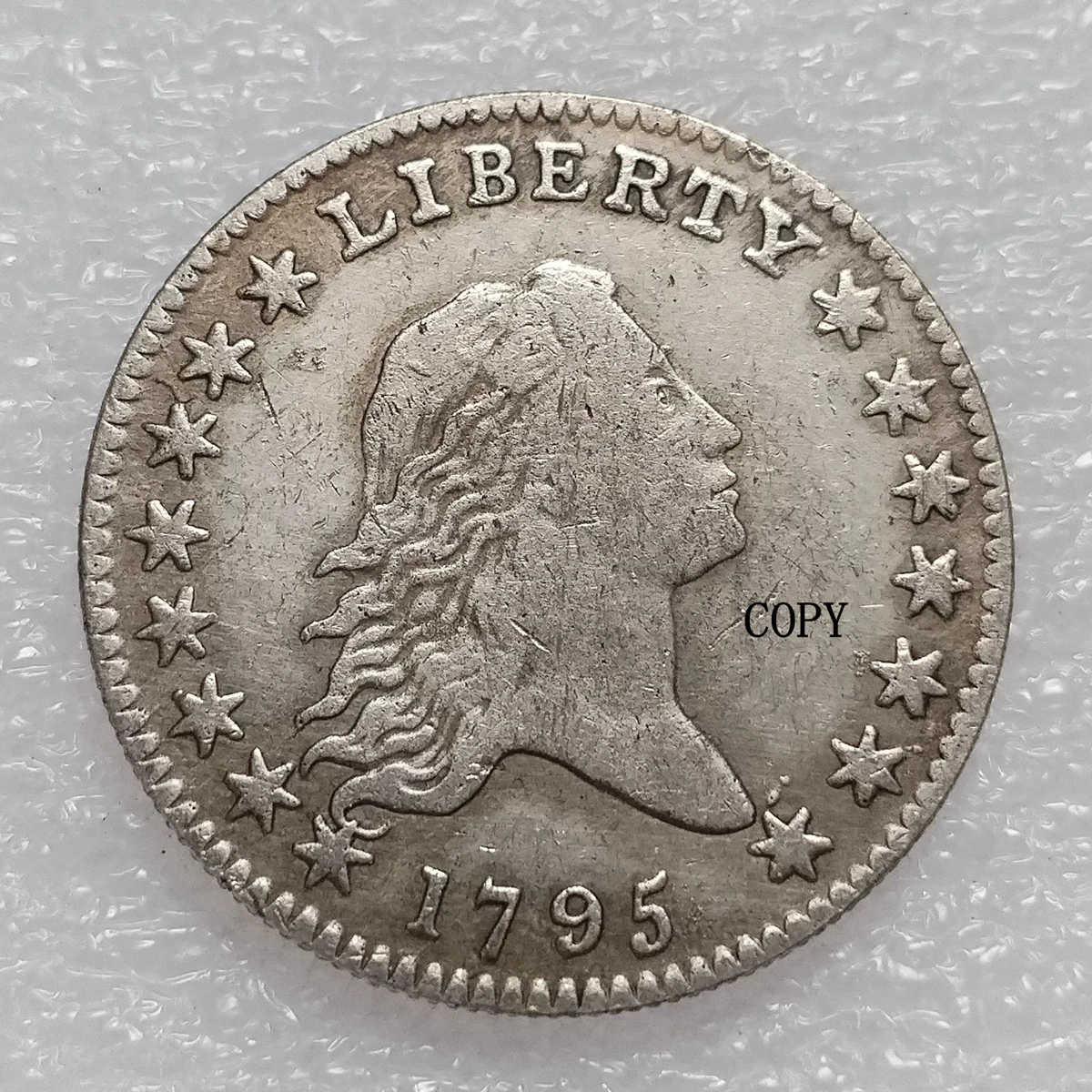 

Копия монеты США "Струящиеся волосы" 1794-1795 года, позолоченная