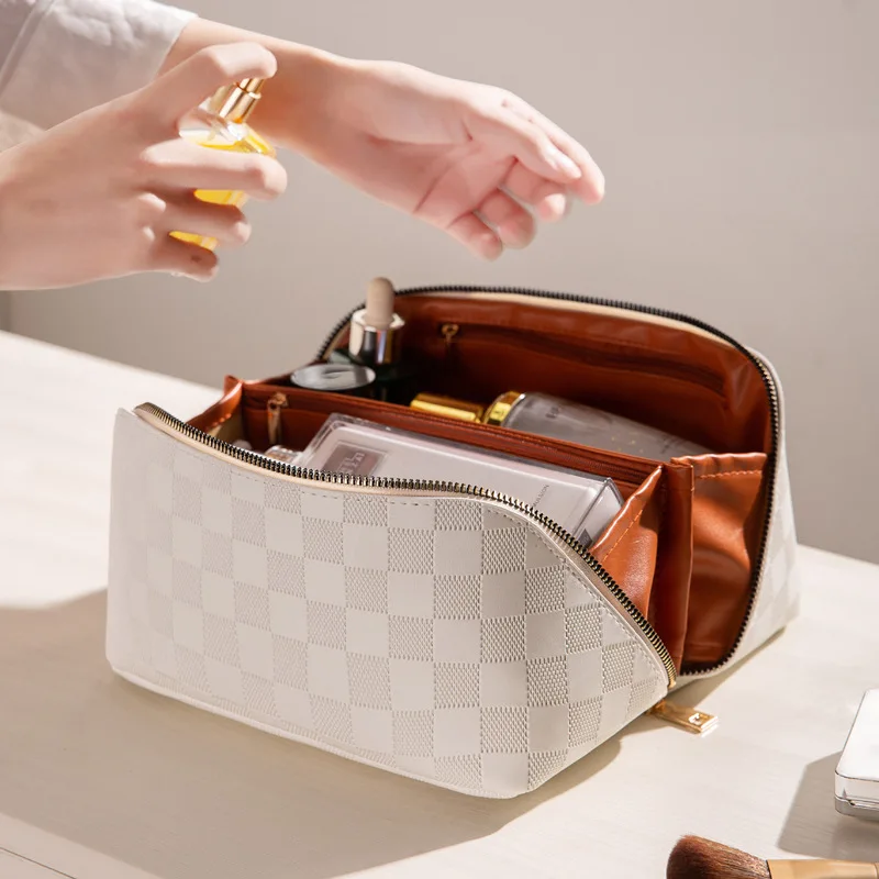 

2023 NEW Large Capacity Travel Cosmetic Bag Portable PU Plaid Makeup Pouch Women Waterproof Bathroom Washbag Storage. Pouch