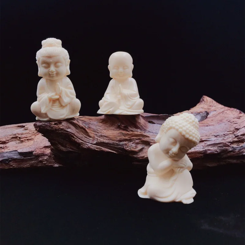Резной орех цвета слоновой кости вращающийся три Святых Шакьямуни Дизань король