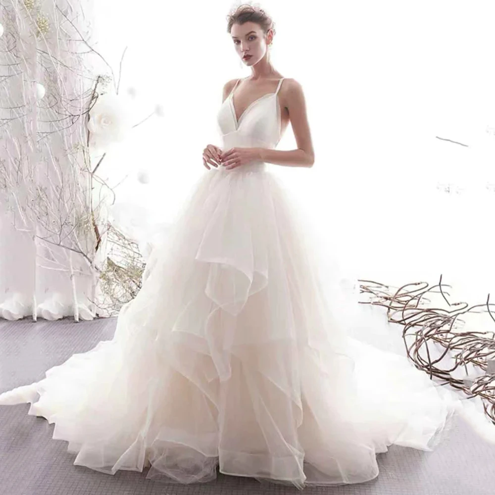

Spaghetti Straps Ruffles Tulle Wedding Dresses A Line Sweep Train V Neck Sleeveless Backless Bridal Gowns For Modern Bride 2022