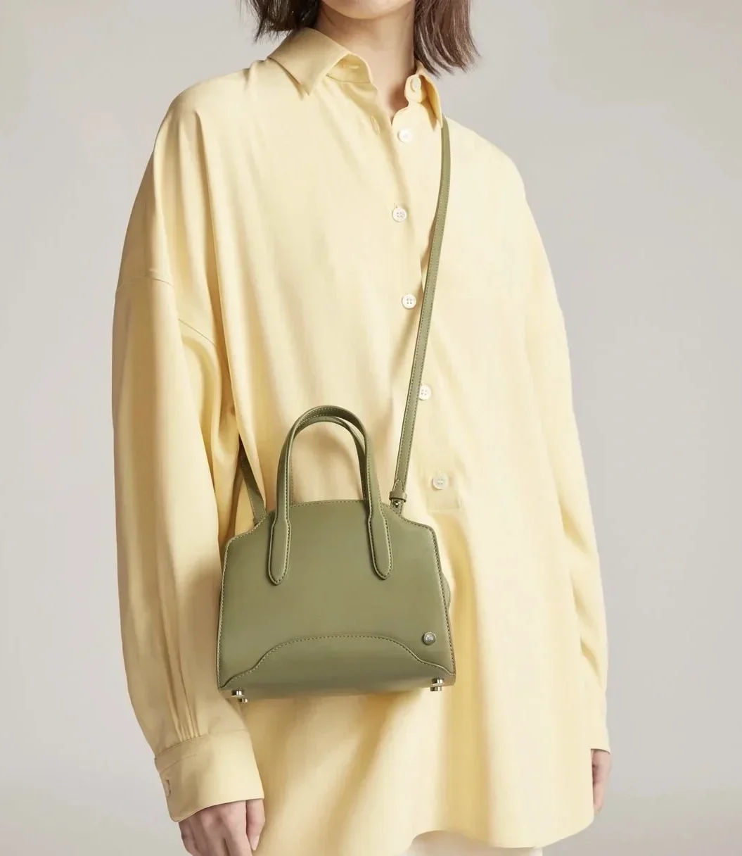 

Cowhide Lcu Lychee Grain Smooth Surface Sesia Handbag Single Shoulder Bag Oblique Cross Package.