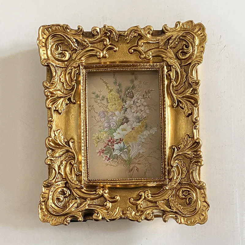 

Золотая прямоугольная фоторамка из смолы