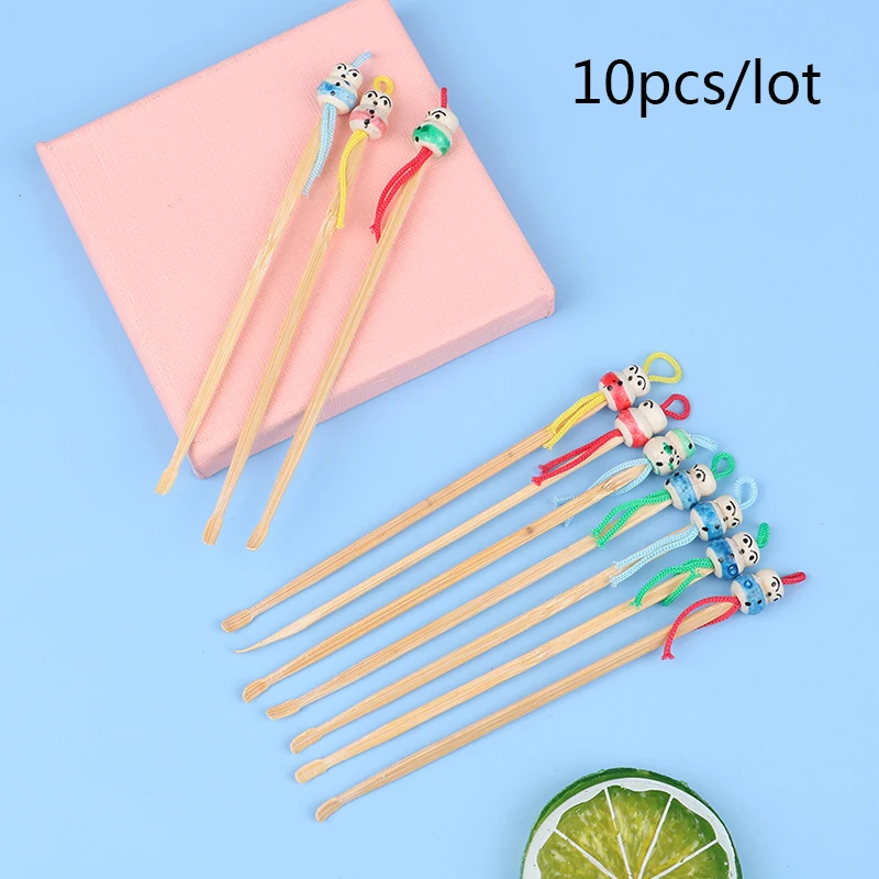 

10pcs/lot CartoonsMini Doll Ear Picks Wood Bamboo Ear Picks Ear Care Tool