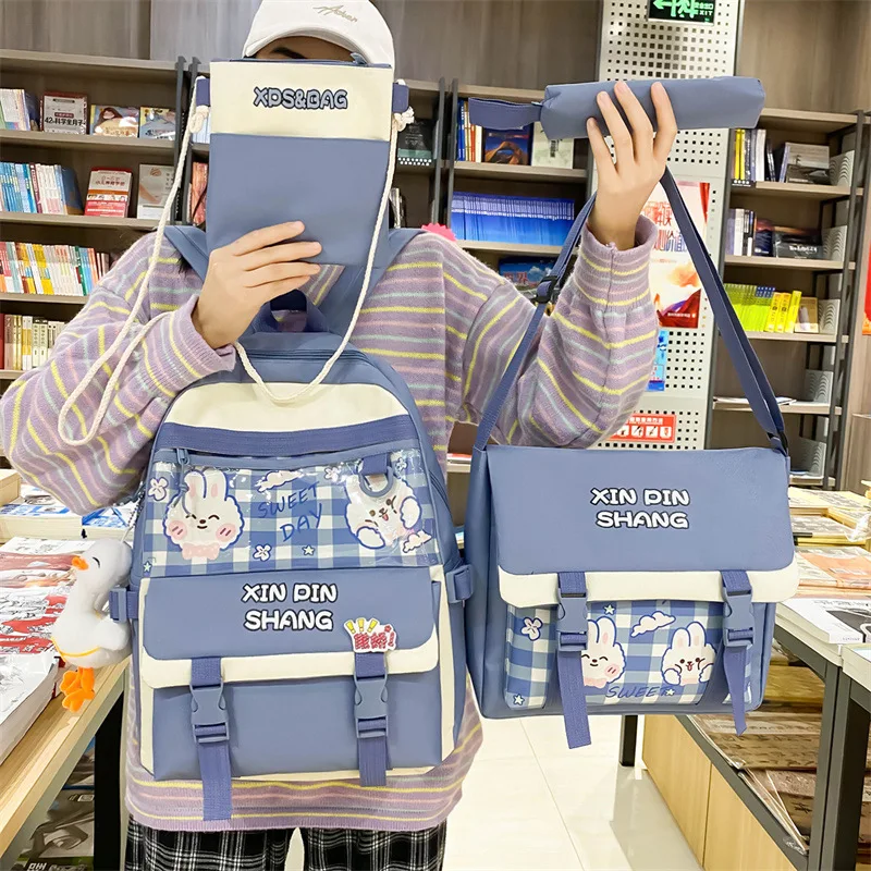 

Qyahlybz female four-piece set campus primary school small fresh large capacity junior high school children girls shoulder bag