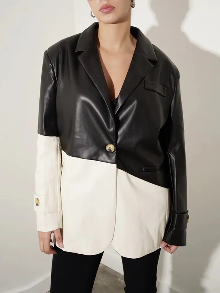 Женское кожаное пальто с длинным