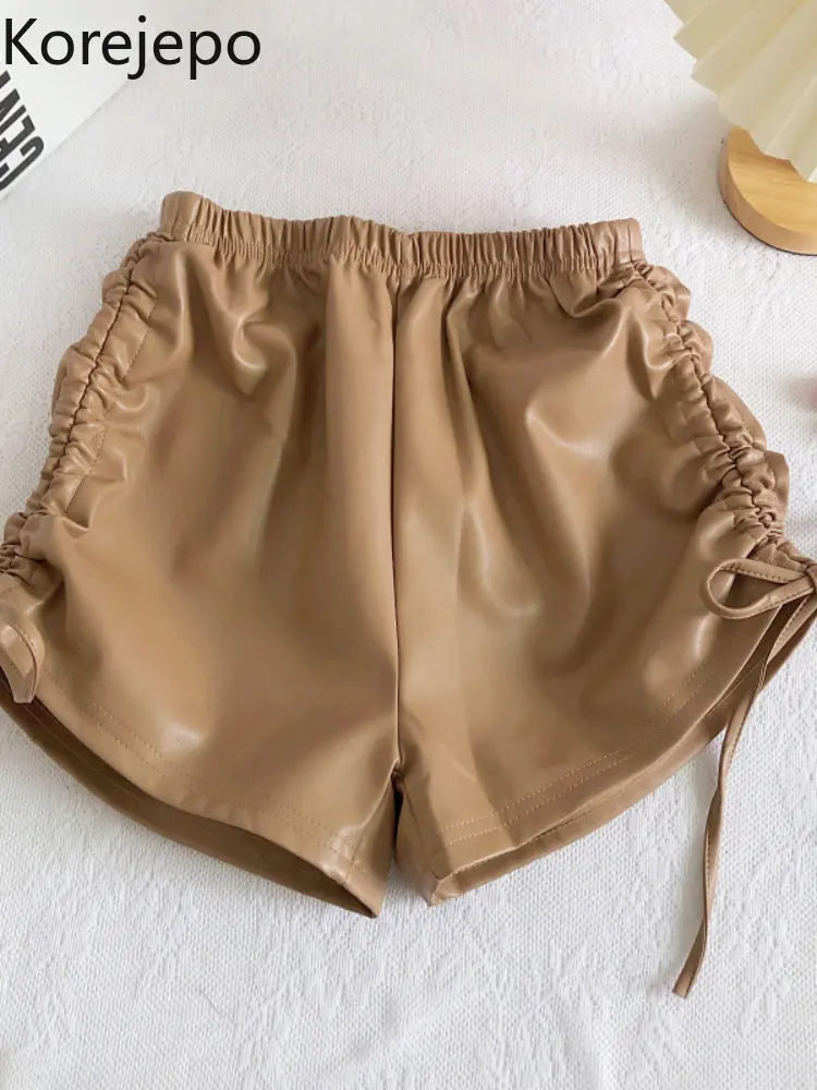 

Шорты женские из экокожи на завязках, зима 2022