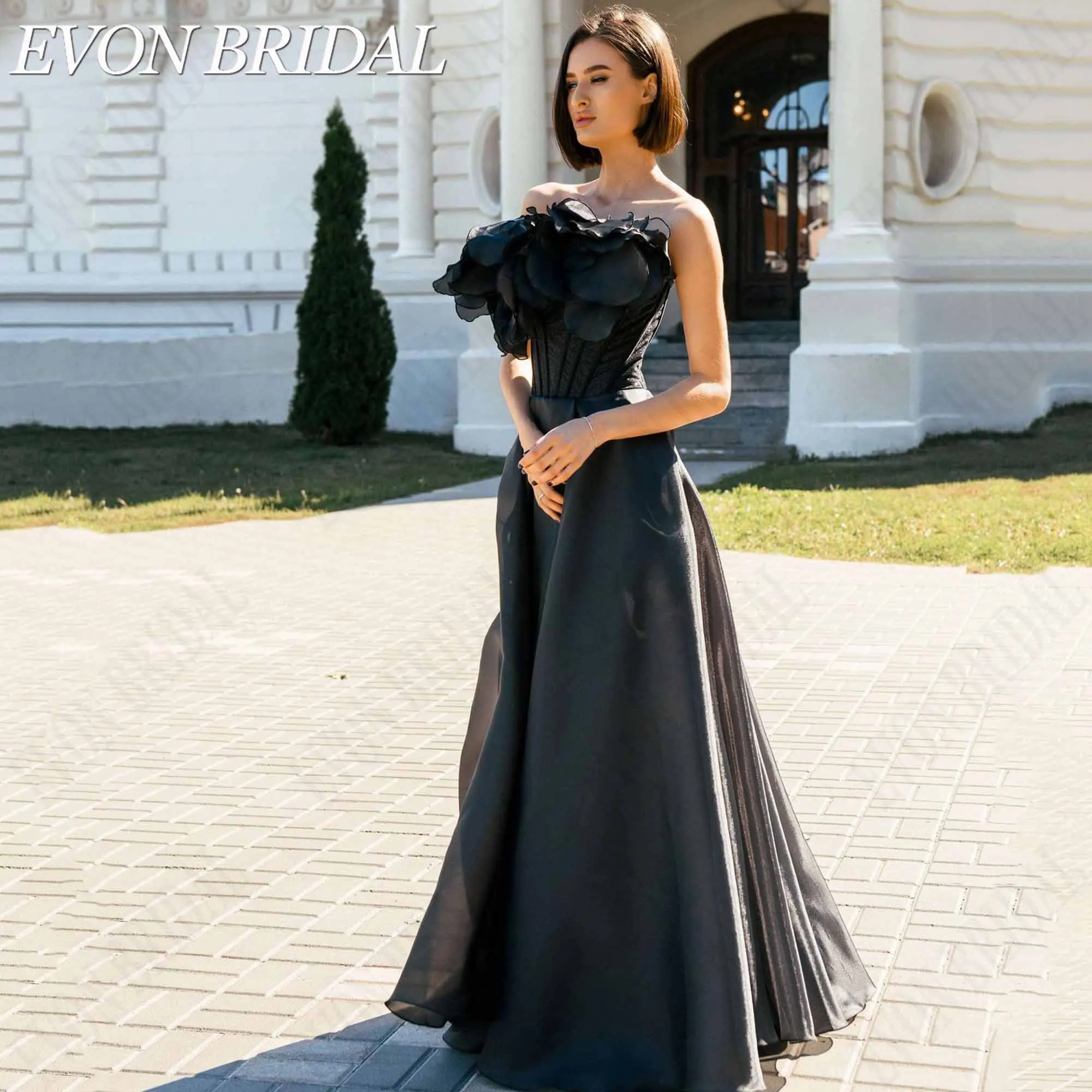 Фото EVON BRIDAL Элегантное вечернее платье без бретелек корсет из органзы с объемными цветами для гостя свадьбы коллекция 2026 на заказ легкая воздушная силуэт объемные цветочные декоры полупрозрачная ткань с уникальной №1