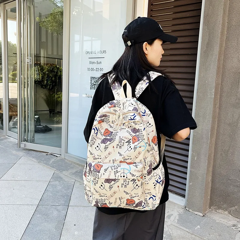 New Korean version schoolbag ins female middle and high school students female fashion large capacity graffiti travel backpack