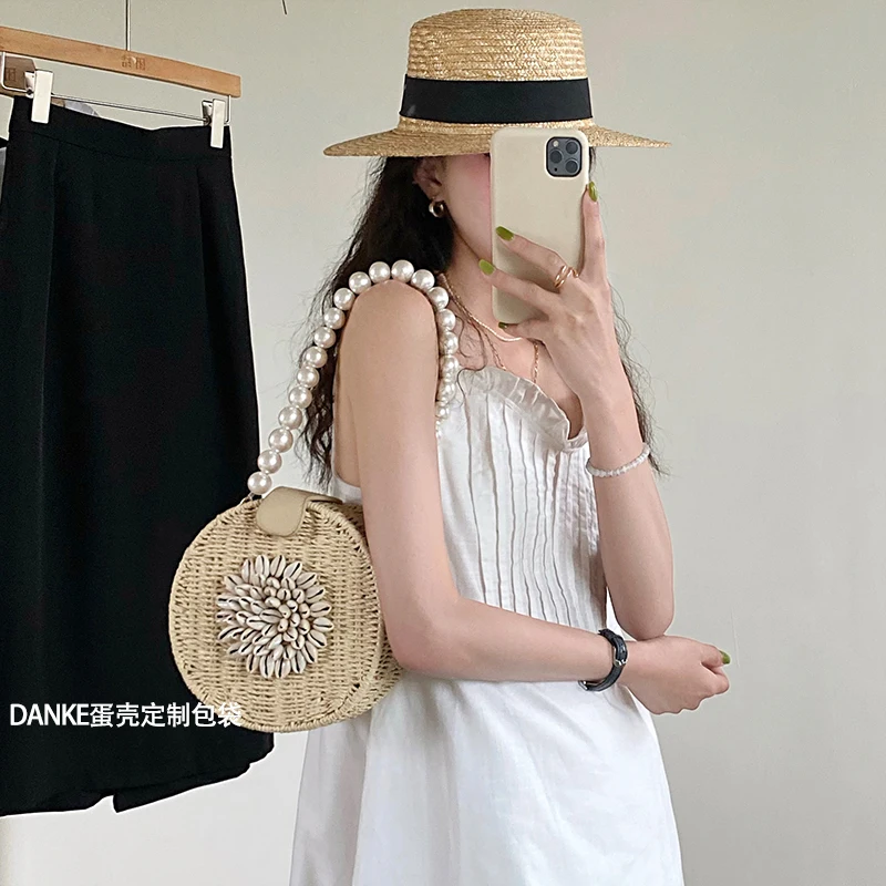 

High-Grade French Style Vintage Pearl Chain Woven Tote Underarm Shoulder Shell Straw Bag Niche Small round Bag