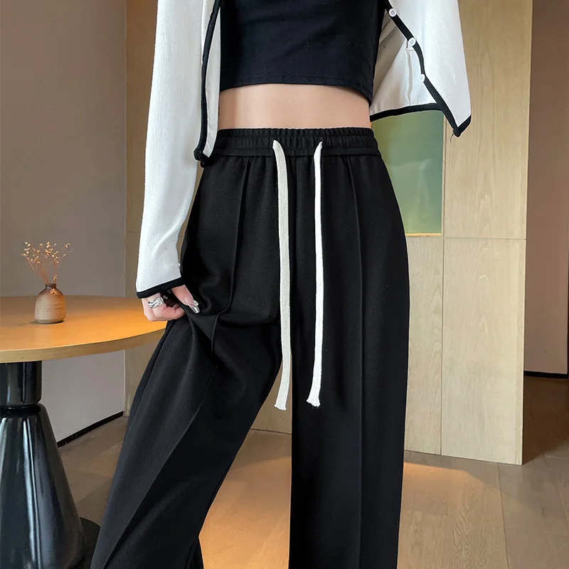 Брюки женские свободные с широкими штанинами декоративный пояс на талию