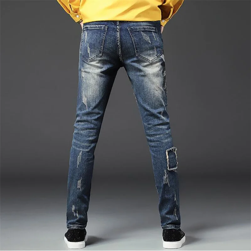 Original design jeans men's denim pants trousers autumn winter new European and American fashion blue elastic hole embroidery