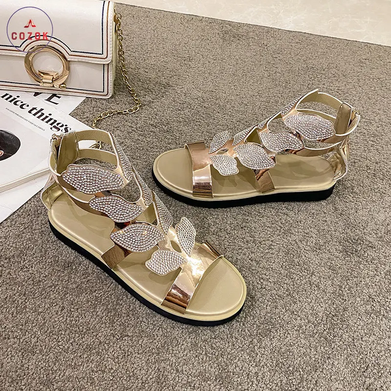 

Сандалии женские летние новые 2022 на платформе модные римские вечерние женские туфли со стразами и крыльями женские сандалии