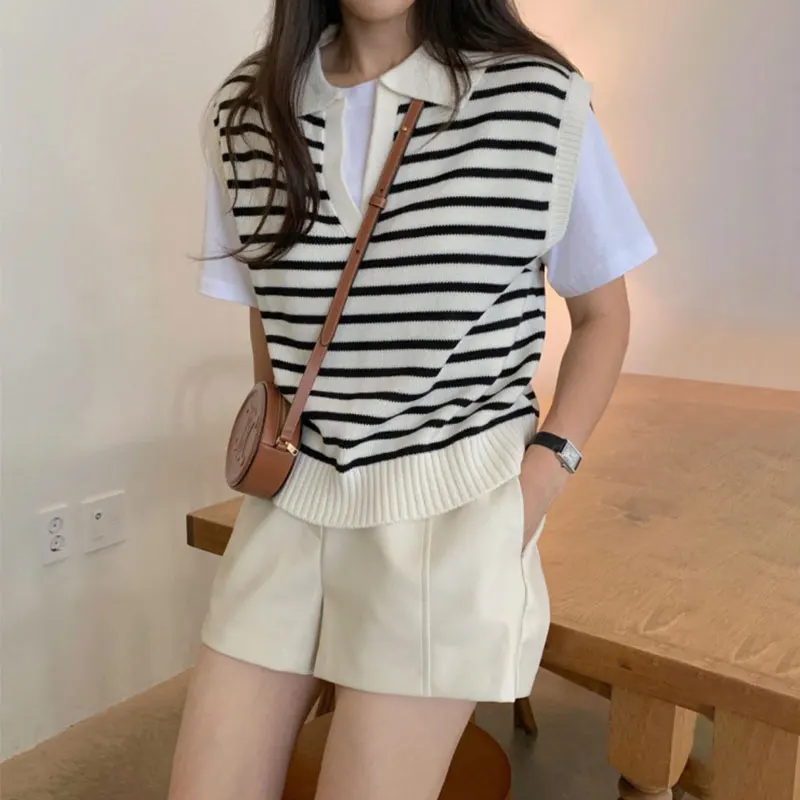 

Clothland Women Sweet Striped Knitting Waistcoat Polo Neck Sleeveless White Black Vest Jacket Casual Tops Mujer MA99