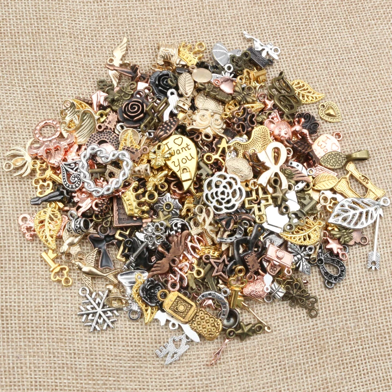 ASOS DESIGN pack of 6 earrings with mixed cute charms in gold tone  ASOS