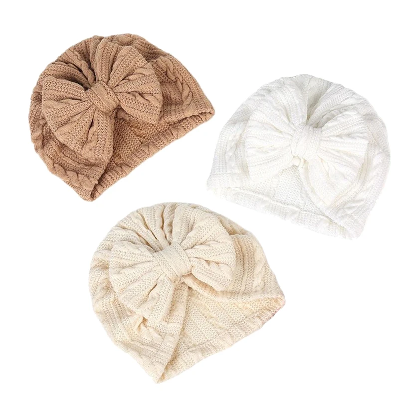 

Шапка-бини однотонная для новорожденных, с бантом