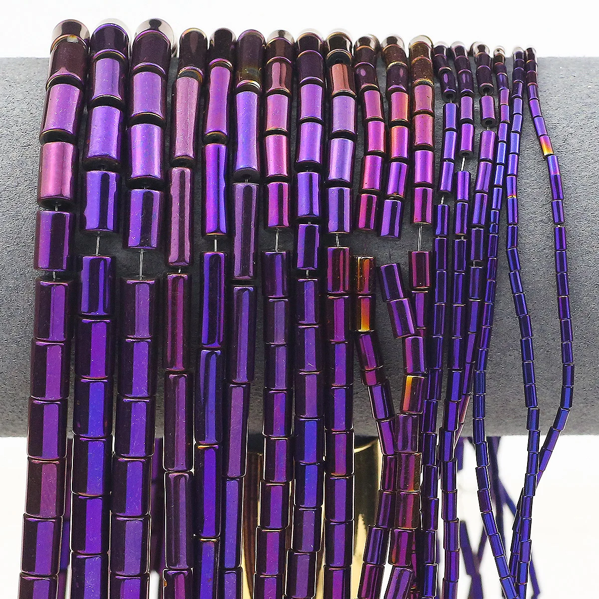 Покрытие Фиолетовая форма цилиндра Гематитовые прокладки из натурального камня