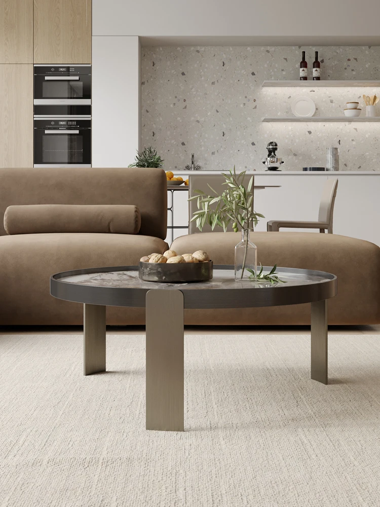 

Modern light luxury tea table simple style small family round rock plate tea table ins net red Designer