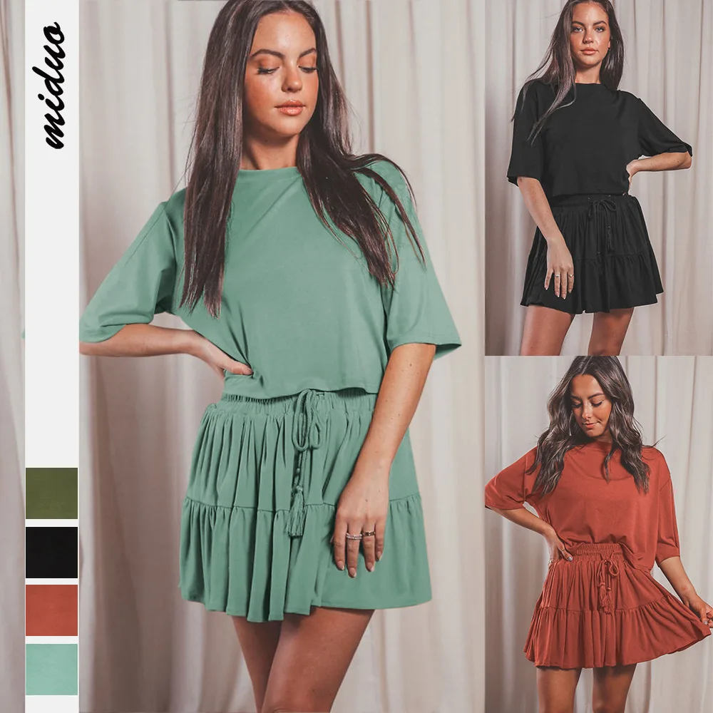 

2022 Amoi Hot Sale Round Neck Solid Color Middle Sleeve Loose Top T-shirt Drawstring Pleated Skirt Commuter Set