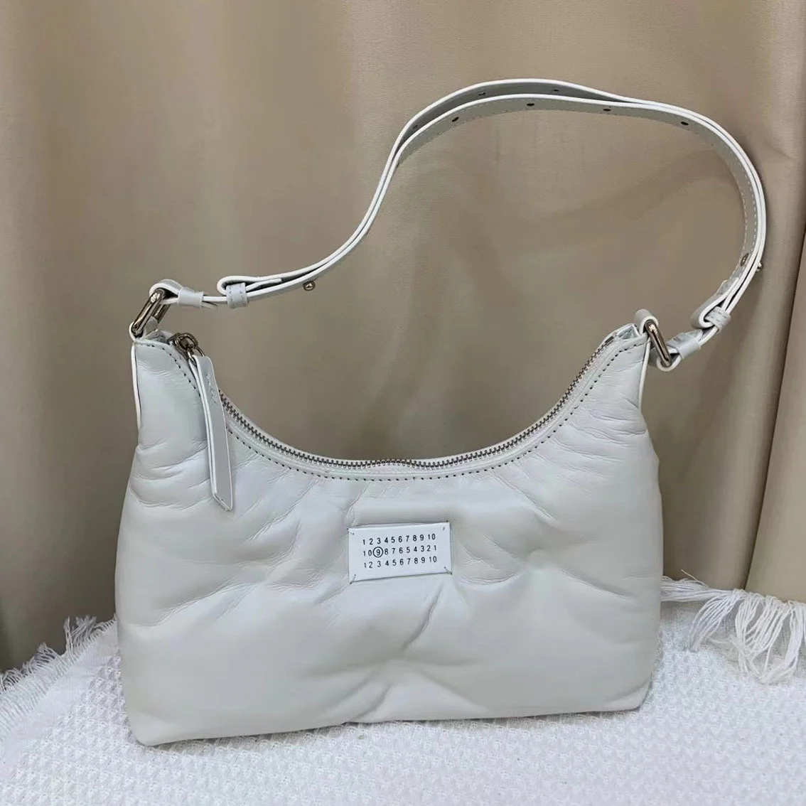 

Высококачественная Роскошная брендовая подмышка из натуральной овечьей кожи, новинка 2023, вместительная простая однотонная женская сумка, ...