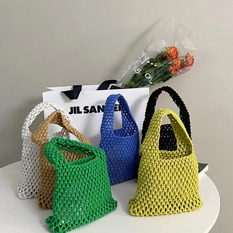 

Casual Hollow Small Tote Bag Designer Rope Woven Women Handbags Summer Beach Fishnet Bag Bali Mini Bucket Purses 2022 Braid Sac