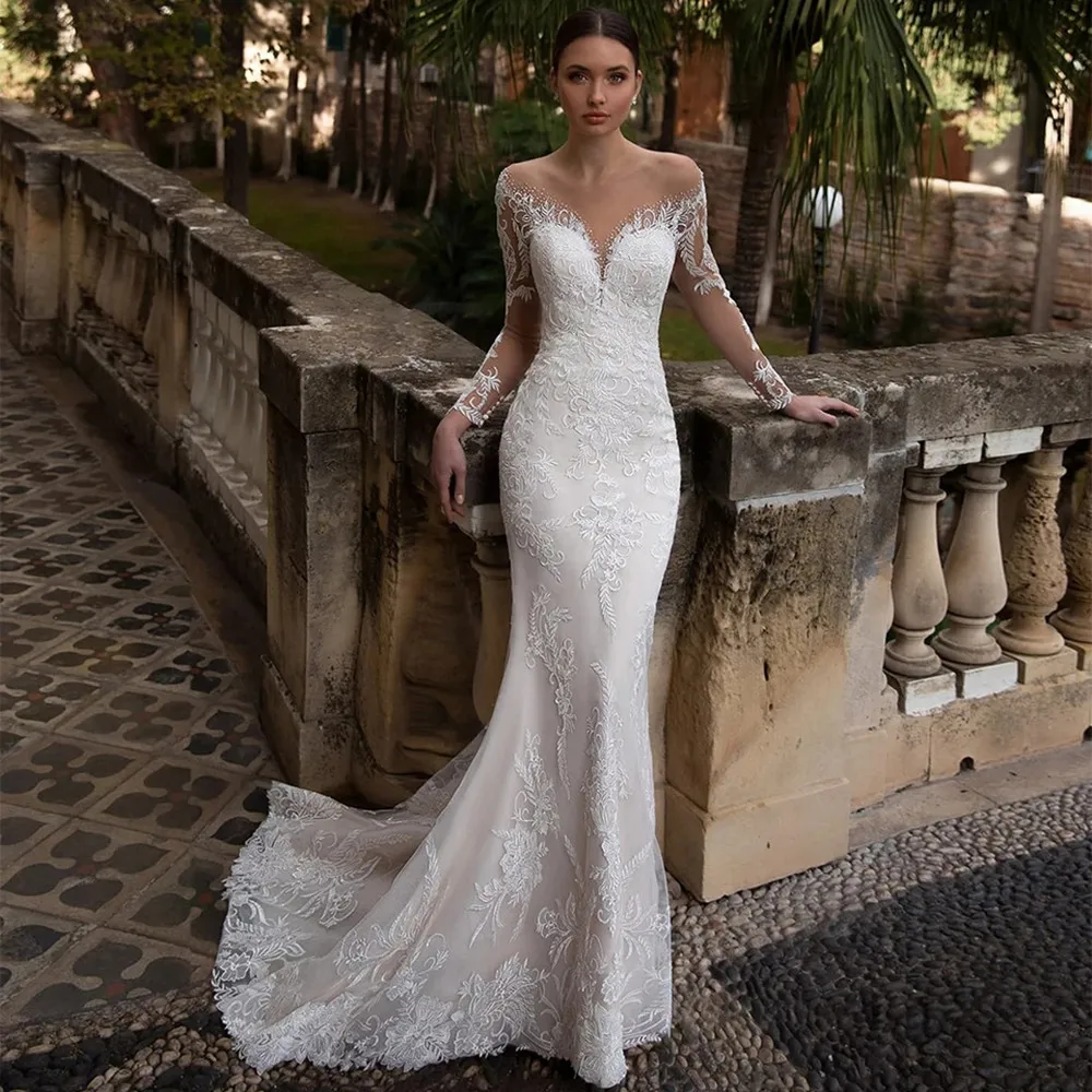 

Sexy Illusion Mermaid Wedding Dresses Sweetheart Neck Illusion Back Court Train Long Sleeves Appliques Trumpet Bridge Gown