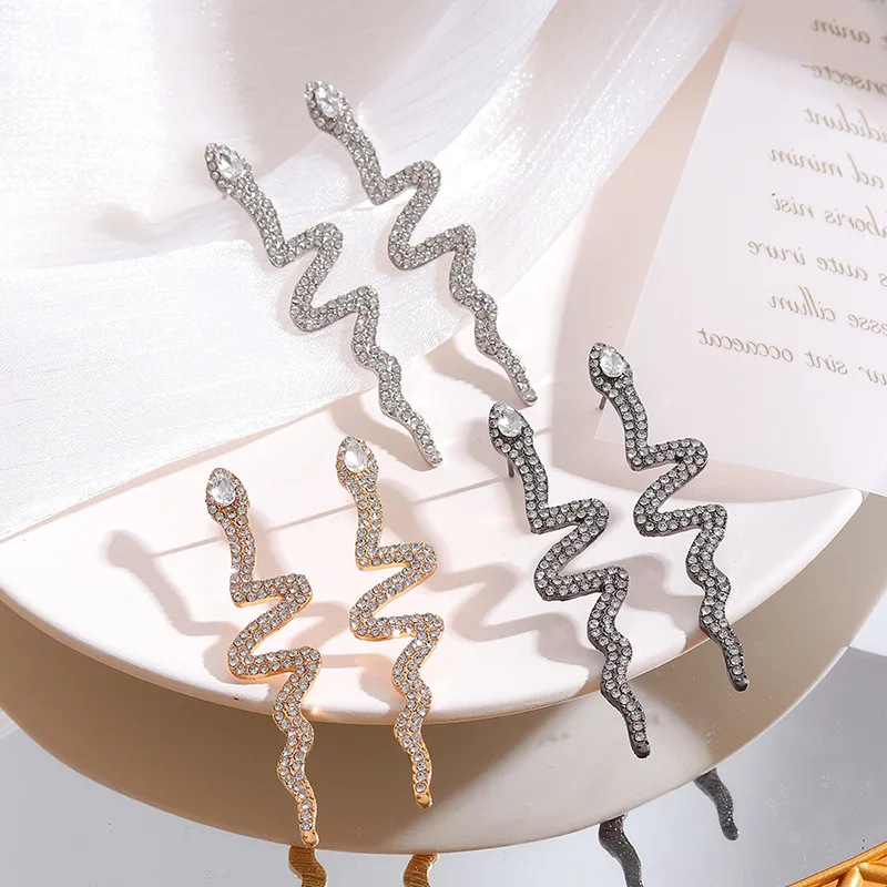 

Fashion Jewelry Snake Earrings Popular Style Geometric Twist Golden Silvery Plating Shiny Crystal Drop Earrings For Women Gifts